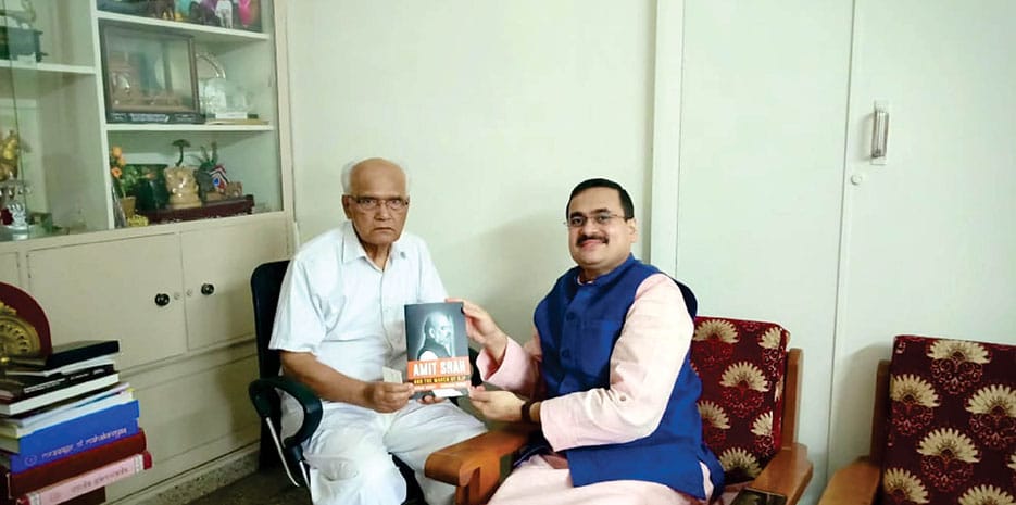 The author, Anirban Ganguly, presenting a copy of the book to Novelist Dr. S.L. Bhyrappa at his residence in Kuvempunagar.